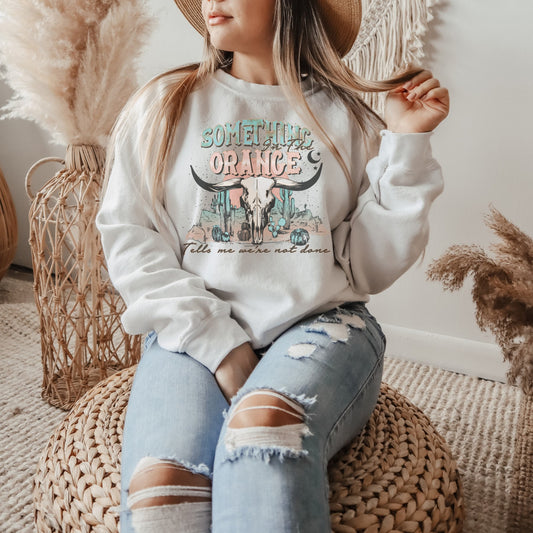 Something in the Orange Sweatshirt